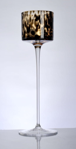 szklany świecznik, świecznik na wysokiej bezbarwnej stopce, świecznik w czarne plamki.JPG